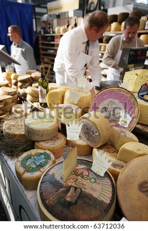 TORINO, ITALY - OCT. 24: Local cheese productions in exhibition at Salone del Gusto, international fair of tastes and slow food October 24, 2010 in Torino, Italy.