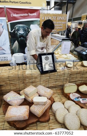 TORINO, ITALY - OCT. 24: Local cheese productions in exhibition at Salone del Gusto, international fair of tastes and slow food on October 24, 2010 in Torino, Italy.