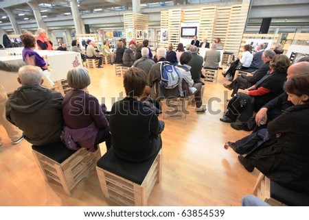 TORINO, ITALY - OCT. 24: People participate to meetings at Salone del Gusto, international fair of tastes and slow food on October 24, 2010 in Torino, Italy.
