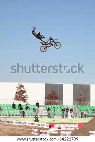 MILAN, ITALY - NOV. 11: Acrobatic performance during Motolive show at EICMA, 67th International Motorcycle Exhibition November 11, 2009 in Milan, Italy.