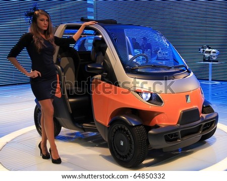 MILAN, ITALY - NOV. 03: Top model at Piaggio vehicles area in exhibition at EICMA, 68th International Motorcycle Exhibition November 03, 2010 in Milan, Italy.