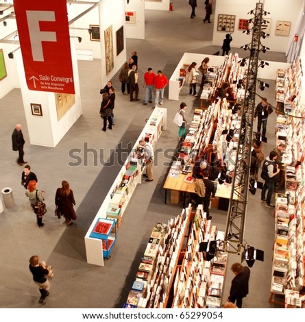 MILAN - MARCH 27: Panoramic view of people looking for art book at MiArt ArtNow, international exhibition of modern and contemporary art March 27, 2010 in Milan, Italy.