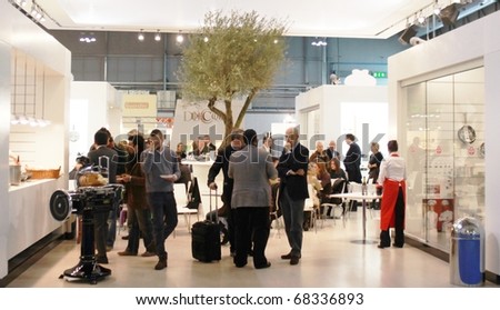 MILAN, ITALY - JANUARY 15: People visit interiors decoration solutions and accessories exhibition at Macef, International Home Show Exhibition January 15, 2010 in Milan, Italy.