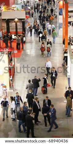 MILAN, ITALY - OCTOBER 08: Panoramic view of people visiting Sfortec 2010, international exhibition of machines, robots, automation and auxiliary technologies on October 08, 2010 in Milan, Italy.