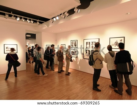 stock-photo-milan-italy-june-people-look-at-phil-stern-photography-collection-at-forma-photography-69309265.jpg