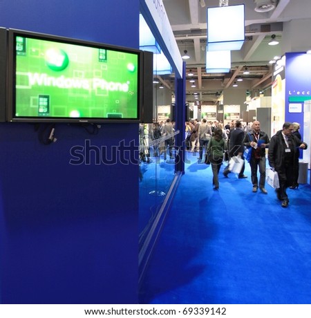 MILAN, ITALY - OCT. 20: People visit pc technologies stands at SMAU, international fair of business intelligence and information technology October 20, 2010 in Milan, Italy.