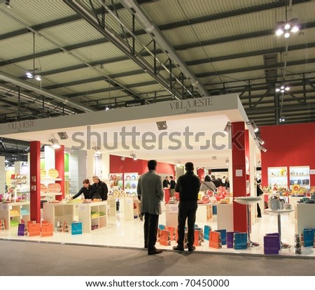MILAN, ITALY - JANUARY 28: People visiting interior decoration stands at Macef, International annual Home Show Exhibition attracting thousands of visitors January 28, 2011 in Milan, Italy.