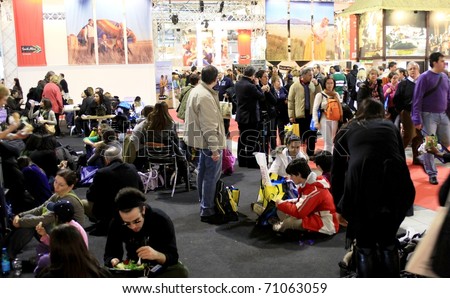 MILAN, ITALY - FEBRUARY 20: People crowd visit BIT, International Tourism Exchange Exhibition February 20, 2010 in Milan, Italy.