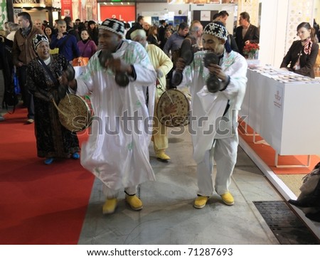 MILAN, ITALY - FEBRUARY 20: Ethnic dancers and musicians during their performance at BIT, International Tourism Exchange Exhibition February 20, 2010 in Milan, Italy.