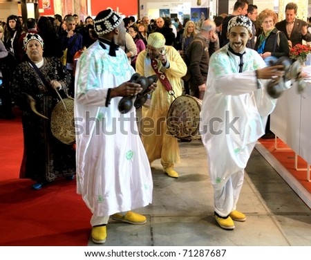 MILAN, ITALY - FEBRUARY 20: Ethnic dancers and musicians during their performance at BIT, International Tourism Exchange Exhibition February 20, 2010 in Milan, Italy.