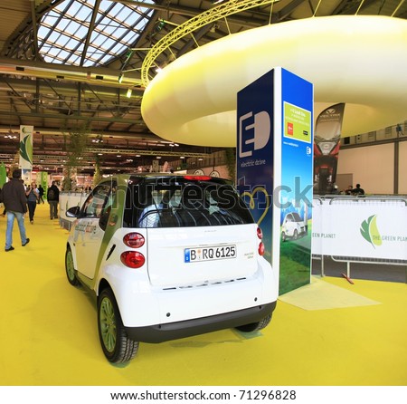 MILAN, ITALY - NOV. 03: Details of Green energy car in exhibition at EICMA, 68th International Motorcycle Exhibition November 03, 2010 in Milan, Italy.