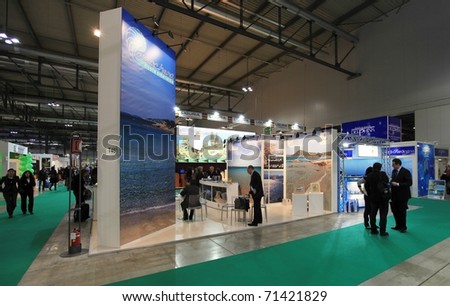MILAN, ITALY - FEBRUARY 17: People visit Arzachena stand, Sardinia regional area, Italy pavilion, during BIT, International Tourism Exchange Exhibition on February 17, 2011 in Milan, Italy.