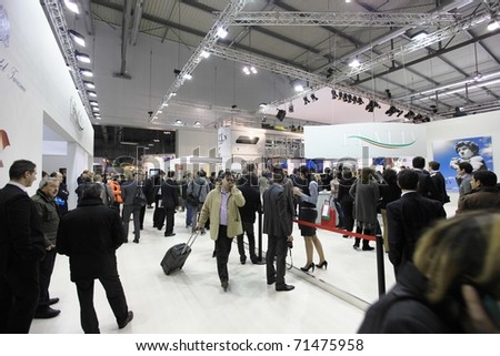 MILAN, ITALY - FEBRUARY 17: People visit Italy tourism pavilion at BIT, International Tourism Exchange Exhibition on February 17, 2011 in Milan, Italy.