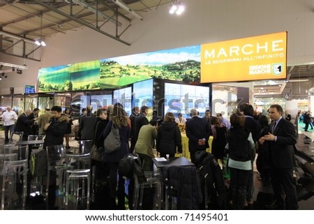 MILAN, ITALY - FEBRUARY 17: People visit Marche regional tourism stand, Italy pavilion at BIT, International Tourism Exchange Exhibition on February 17, 2011 in Milan, Italy.