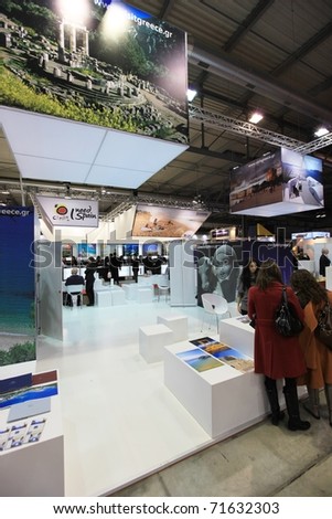 MILAN, ITALY - FEBRUARY 17: People visit Greece tourism stands at the World pavilion at BIT, International Tourism Exchange Exhibition on February 17, 2011 in Milan, Italy.