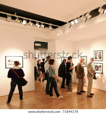 MILAN, ITALY - JUNE 16: People look at Phil Stern photography collection at Forma Photography Foundation June 16, 2010 in Milan, Italy.