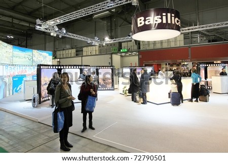 MILAN, ITALY - FEBRUARY 17: People visiting Basilicata regional stand at Italian pavilion tourism during BIT International Tourism Exchange Exhibition on February 17, 2011 in Milan, Italy.