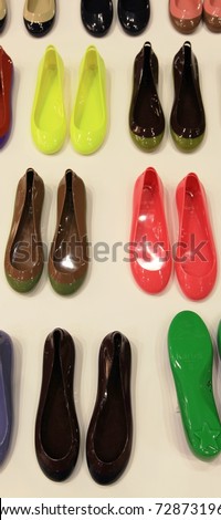 MILAN, ITALY - JANUARY 28: Colored plastic shoes design products in exhibition at Macef, International Home Show Exhibition January 28, 2011 in Milan, Italy.