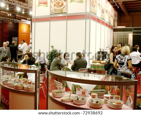 MILAN, ITALY - JUNE 10: Visiting local products stand at Italian regional pavilion during Tuttofood 2009, World Food Exhibition June 10, 2009 in Milan, Italy.