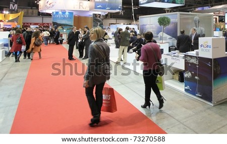 MILAN, ITALY - FEBRUARY 20: People visit Greece national tourism stand during BIT, International Tourism Exchange Exhibition on February 20, 2010 in Milan, Italy.