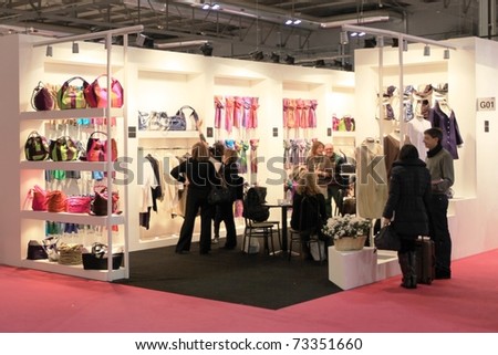 MILAN, ITALY - JANUARY 28: People visit stands looking for design and interior decoration products at Macef, International Home Show Exhibition January 28, 2011 in Milan, Italy.