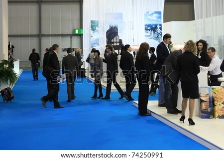 MILAN, ITALY - FEBRUARY 17: People visit stands at Italy and World tourism pavilions at BIT, International Tourism Exchange Exhibition on February 17, 2011 in Milan, Italy.