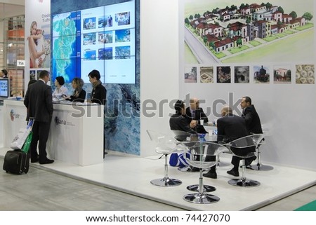 MILAN, ITALY - FEBRUARY 17: People visit stands at Italy and World tourism pavilions at BIT, International Tourism Exchange Exhibition on February 17, 2011 in Milan, Italy.