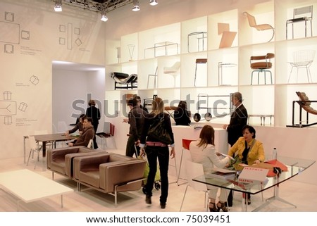 MILAN - APRIL 15: People visit interior design stands in exhibition at Salone del Mobile, international furnishing accessories exhibition April 15, 2010 in Milan, Italy.