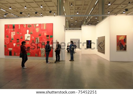MILAN - APRIL 08: People look at painting and sculpture art galleries during MiArt ArtNow, international exhibition of modern and contemporary art on April 08, 2011 in Milan, Italy.