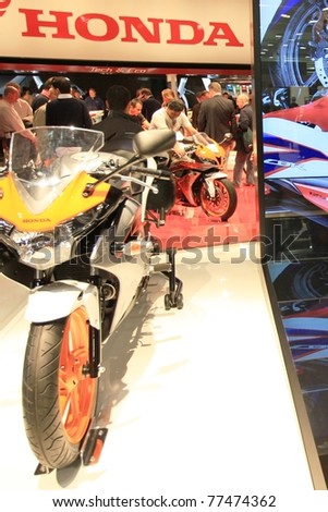MILAN, ITALY - NOV. 03: Details of new Honda motorcycles stand in exhibition at EICMA, 68th International Motorcycle Exhibition November 03, 2010 in Milan, Italy.