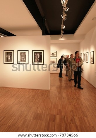 MILAN, ITALY - JUNE 16: People look at Phil Stern photography collection at Forma Photography Foundation June 16, 2010 in Milan, Italy.