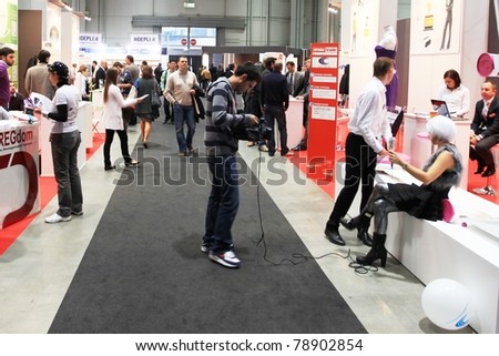 MILAN, ITALY - OCT. 20: People interview at SMAU, international fair of business intelligence and information technology October 20, 2010 in Milan, Italy.