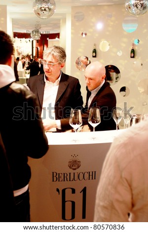 VERONA - APRIL 08: People visit Berlucchi wine production stand at Vinitaly, international wine and spirits exhibition April 08, 2010 in Verona, Italy.