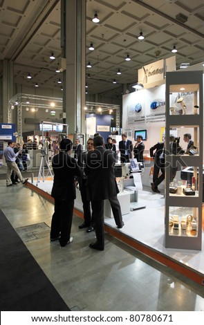 MILAN, ITALY - OCT. 20: People visit products stands at SMAU, international fair of business intelligence and information technology October 20, 2010 in Milan, Italy.