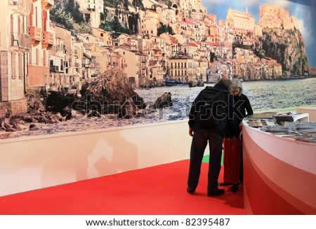MILAN, ITALY - FEBRUARY 17: People visit regional tourism stands, Italy pavilion at BIT, International Tourism Exchange Exhibition on February 17, 2011 in Milan, Italy.