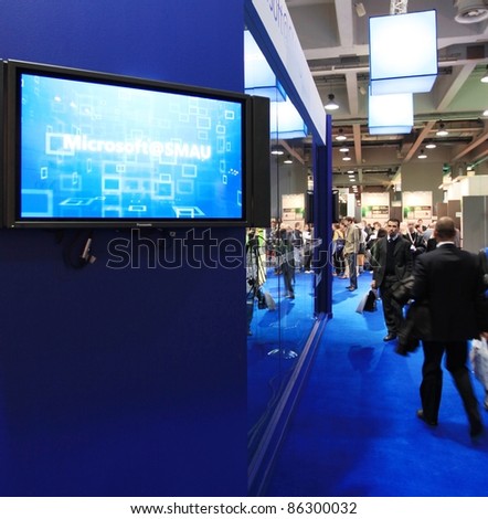 MILAN, ITALY - OCT. 20: People visit Windows technoloiges area at SMAU, international fair of business intelligence and information technology October 20, 2010 in Milan, Italy.