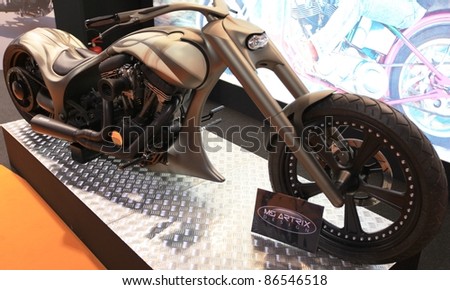 MILAN, ITALY - NOV. 03: Details of special Low Ride motorcycle in exhibition at EICMA, 68th International Motorcycle Exhibition on November 03, 2010 in Milan, Italy.