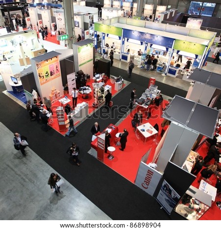 MILAN, ITALY - OCT. 20: Panoramic view of people visiting technologies areas at SMAU, international fair of business intelligence and information technology October 20, 2010 in Milan, Italy.