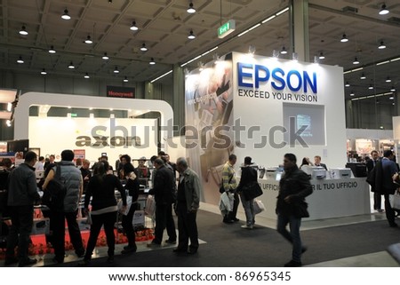 MILAN, ITALY - OCT. 19: People visit Epson technologies stands at SMAU, international fair of business intelligence and information technology October 19, 2011 in Milan, Italy.