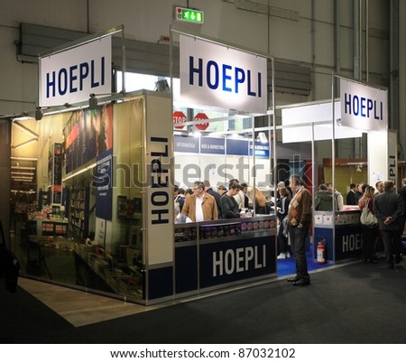 MILAN, ITALY - OCT. 19: People visit Hoepli stand during SMAU, international fair of business intelligence and information technology October 19, 2011 in Milan, Italy.
