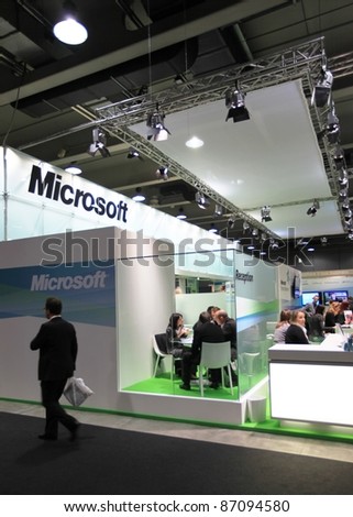 MILAN, ITALY - OCT. 19: People at Microsoft technologies area during SMAU, international fair of business intelligence and information technology October 19, 2011 in Milan, Italy.