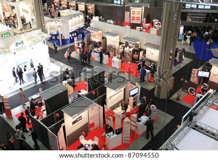 MILAN, ITALY - OCT. 19: Panoramic view of people visiting technologies stands at SMAU, international fair of business intelligence and information technology October 19, 2011 in Milan, Italy.