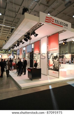 MILAN, ITALY - OCT. 19: People visit Telecom technologies stands at SMAU, international fair of business intelligence and information technology October 19, 2011 in Milan, Italy.