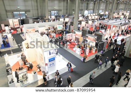 MILAN, ITALY - OCT. 19: People visit technologies stands at SMAU, international fair of business intelligence and information technology October 19, 2011 in Milan, Italy.