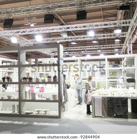 MILAN, ITALY - JANUARY 28: People visit design and interior decoration products area at Macef, International Home Show Exhibition on January 28, 2011 in Milan, Italy.