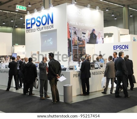 MILAN, ITALY - OCT. 19: People visit Epson technologies stands at SMAU, international fair of business intelligence and information technology on October 19, 2011 in Milan, Italy.