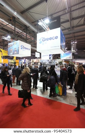 MILAN, ITALY - FEBRUARY 16: People visit Greece tourism exhibition area during BIT, International Tourism Exchange Exhibition February 16, 2012 in Milan, Italy.