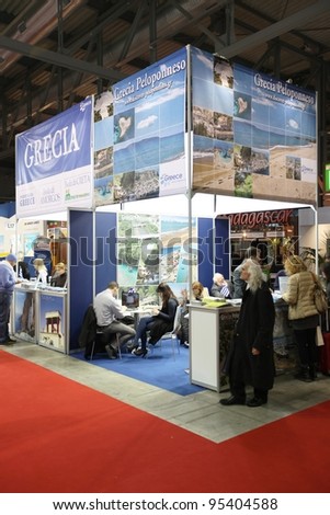MILAN, ITALY - FEBRUARY 16: People visit Greece tourism exhibition area during BIT, International Tourism Exchange Exhibition February 16, 2012 in Milan, Italy.