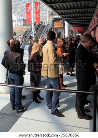 MILAN - APRIL 15: People at the entrance of Salone del Mobile, international furnishing accessories exhibition April 15, 2010 in Milan, Italy.