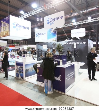 MILAN, ITALY - FEBRUARY 16: People visit Greece tourism exhibition area at BIT, International Tourism Exchange Exhibition on February 16, 2012 in Milan, Italy.
